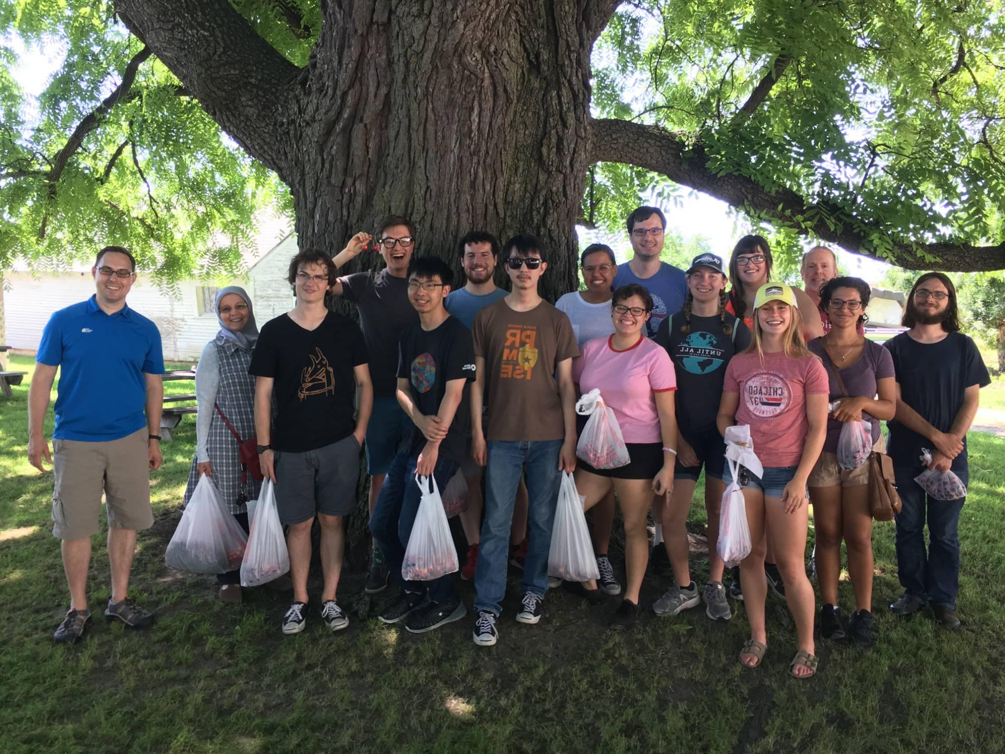 2020: REU Students picking fruit for Group Fun